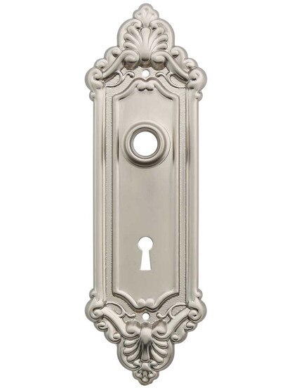 Stamped Brass French-Baroque Back Plate with Keyhole in Satin Nickel.